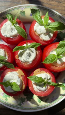 SAVE my WHIPPED RICOTTA STUFFED TOMATOES! FULL RECIPE BELOW. I promise you will be making this simple and easy appetizer on repeat!! Makes 8 Whipped Ricotta 2 cups whole whole milk ricotta 2 tbsp milk ¼ cup grated Parmigiano Reggiano  ½ teaspoon salt ¼ cup fresh basil chopped Balsamic Vinaigrette ⅓ olive oil 3 tbsp balsamic vin 1½ tbsp honey ½ salt ½ orange juiced Everything Else 8 on-the-vine tomatoes, rinsed well. 8 basil sprigs for garnish -The night before I prepped both the whipped ricotta and the balsamic vinaigrette.  -To prep the whipped ricotta, add the ricotta, milk, grated parm and salt to a blender. Blend until smooth creamy then mix in the chopped basil. Store in refrigerator -To prep the balsamic vinaigrette, add all of the balsamic vinaigrette ingredients to a blend and blend well. Store in refrigerator.  -Day of, remove tomato from vine, flip and cut off just enough of the bottom so that you can remove the seeds. Fill each tomato with about a tbsp of balsamic vin and ⅛ of the whipped ricotta. Note: I flip the tomatoes so that they are more stable and will sit up.  -Garnish with basil and store in refrigerator until ready to serve. 