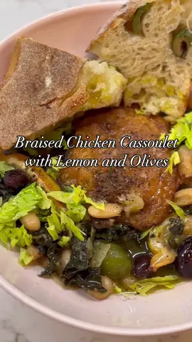 🍋🫒🌿Braised Chicken Cassoulet 🥘💛🫘 • ** SAVE THIS POST** Recipe ingredients: 4 chicken thighs - bone in and skin on  3 tablespoons flour Olive oil Salt  Pepper • 1/2 onion 🧅 sliced 3 stalks of celery chopped 1 can of drained white cannellini beans 1 bunch of kale or 2 cups roughly chopped 1/3 cup dry white wine 1 cup chicken broth 2 cloves of garlic chopped 1 sprig of fresh rosemary  1- 2 lemons 🍋 quartered  1/2 cup of mixed green and Kalamata olives 3 tablespoons butter Celery leaves for garnish  Good crusty bread 🍞  • METHOD: Season both sides of the chicken with 2 teaspoons salt and 1 teaspoon of pepper. Dust the seasoned chicken in flour and set on a plate. Add 2 tablespoons of olive oil to a bottom heavy skillet- I’m using a @lecreuset braising pan. Turn to medium high heat and add in chicken skin side down and lower heat to medium. Cook chicken on one side h til golden brown and crispy- about 10 minutes. Then flip the chicken and cook for another 8 minutes on medium. Remove the chicken from the pan and set aside (it is still raw In The middle!) to the pan with lots of good chicken fat and olive oil, add onions and celery. Season with 1 teaspoon of salt and a little pepper and saute on medium heat for 5 minutes. Next, add in the can of beans, kale, garlic, wine and chicken broth. Stir together on medium heat and then add in the rosemary, butter and nestle the chicken back into the saucepan. Next add the lemons and olives.  Pop into the oven at 350 degrees for 15-20 minutes. Garnish with some fresh torn celery leaves a squeeze of lemon juice and a pinch of @maldonsalt on top! Serve it with so really yummy crusty bread- mine is from @bubandgrandmasbread ! • Enjoy!! • With love + salt, 🧂 Em 🍋 #chickenrecipe #recipesoftiktok #cookingathometiktoktv #cookingtiktok 