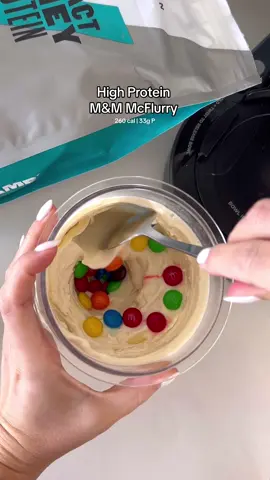 HIGH PROTEIN M&M McFLURRY 🍦 Recipe:  - 1 scoop @myprotein vanilla whey protein  - 100ml lite milk - 100g high protein yoghurt  - 1 tsp stevia  - 15 M&M’s  @Ninja Kitchen Australia #ninjakitchenau #Nojudgement #CreamiDeluxeAU