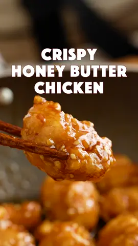 Who doesn’t love a crispy honey butter fried chicken! 🍗🍯🧈  Ingredients  Chicken breast or thigh 400grams ( 0.88lb ) Cornstarch 1 cup Egg 1 White pepper ¼ tsp Soy sauce 1 tbsp Neutral oil for frying  Toasted sesame seeds 1 tbsp Spring onions ( green onions )  For Honey Butter Sauce Garlic 2-3 cloves Honey 4 tbsp Butter 4 tbsp Brown sugar 1 tbsp Soy sauce 2 tbsp  Sesame oil 1 tbsp Cornstarch slurry ( Mix ½ tsp cornstarch with 2 tbsp water ) Crushed chillies 1 tsp ( Optional ) Cut chicken into bite-size cubes and place them in a bowl. Add one egg, soy sauce, and white pepper. Mix it well with the chicken pieces. Add cornstarch and coat the chicken pieces well.  Fry the chicken pieces in the hot oil for 1-2 minutes. Set it aside and let it cool down for few minute. Then fry it again in the hot oil for 2-3 minutes or until crispy golden brown.  Heat the pan to medium heat, melt 2 tbsp butter and saute the garlic for 1-2 minutes until fragrant. Reduce the heat to low, then add soy sauce, honey, sugar, more butter, sesame oil, cornstarch slurry and crushed chillies. Stir until the sauce is thick and glossy.  Add the fried chicken to the sauce. Toss it well and sprinkle sesame seeds and spring onions. Enjoy! #honeybutter #friedchicken #Recipe #crispychicken 