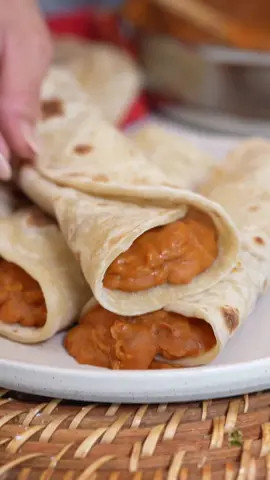 Sometimes All I Want is a BEAN & CHEESE BURRITO, Seriously the BEST cheesy refried beans! Now let me tell you my kids live off these burritos, nobody says no to homemade beans specially when they are wrapped in a fresh flour tortilla, the most simple dish is always the best ♥️ ‼️the beans will thicken up as they cool **you can always add onion, chorizo and jalapeños before frying!  Ingredients:     For the flour tortillas: to make 16-18 I aim for 74g each ball 5 cups APF Salt I used 2 tsp 8 tbsp unsalted butter 1 3/4-2 cups hot water        For my beans 1 lb pino or Peruvian bean Coarse salt I used 2 tsp  8 cups water 3 New Mexico or guajillo chile pods 1 garlic clove 1/4 onion  1/4 tsp ground cumin 1/4 tsp oregano 1/2 tsp salt (optional) 1 lb cheese I use medium cheddar and Oaxaca  1 serving of love 💕  #refriedbeans #beanandcheese #chilibeans #instantbeans #burritos #flourtortillas #EasyRecipes #mexicanfood #mexico #recetasfaciles #tortllas #tortillasdeharina 