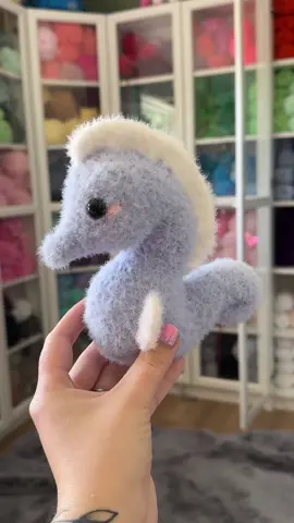 Definitely one of my favorites!!! . Pattern available on my etsy! Yarn feels like bliss lion brand from @Michaels Stores  . #crochet #crocheter #crochetgrove #crochetwithme #seahorse #crochetseahorse #fluffy