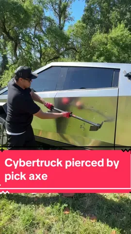 Pick axe pierces Cybertruck door. This Truck is unlike anything ever made #fyp #viral #tesla #tsla #Cybertruck #teslacybertruck #pickaex Cybertruck is the best vehicle ever made 