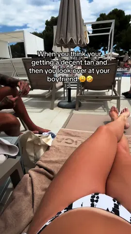 How is it I have to bask in the sun for hours to get a nice tan and he goes this colour within a few days 😤 #tanning #gottakeepthetanup #sunbathing #tanlines #fyp #foryoupage #poolday #poolside #funnyvideos #funny #tanned #traveltiktok 