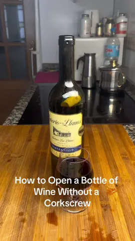 How to Open a Bottle of Wine Without a Corkscrew #lifehackvideo #lifehackvideo 