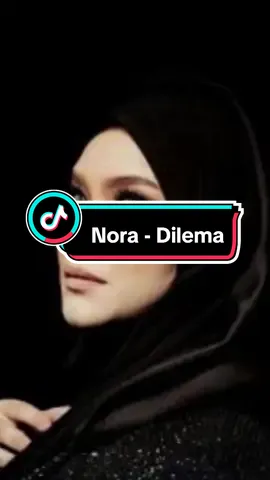 Nora Ariffin, ia adalah penyanyi lagu 'Di Persimpangan Dilema' yang telah dirilis pada tahun 1994 silam. #nora  #nostalgic  #lagu80an90an  #lyrics  #lagukenangan  #dilema  #foryoupage 