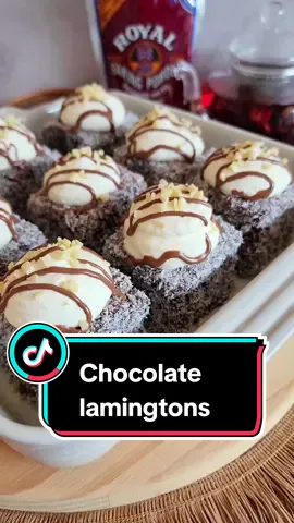 CHOCOLATE LAMINGTONS Enjoyed with a cup of tea, my husband and I love a good tea time treat, and these chocolate lamingtons are perfect. You will need: Vanilla sponge cake 3 eggs - room temperature  1 cup sugar 2 tsp vanilla essence  125g butter/baking margarine - melted  1 cup milk  2 cups cake flour  4 tsp @royalbakingpowdersa 1/2 tsp salt  Chocolate sauce 1 1/2 cups icing sugar 1/4 cup cocoa powder - sifted 1 cup milk  2 cups desiccated coconut  Topping  1 cup whipped cream 1 tbsp icing sugar 60g chocolate- melted Almond nibs  ~Preheat your oven to 180 degrees and line a square baking dish.  ~In a bowl, whisk your eggs and sugar until pale and fluffy.  ~Melt your butter or baking margarine and allow it to cool completely.  ~Mix in your vanilla essence followed by your melted butter. Add in your milk and whisk until well incorporated.  ~Sift your flour and baking powder and add it to your mixture. Add in a little at a time, whisking in between until you have a smooth consistency.  ~Add your cake batter to your baking dish and bake for 30-35 minutes.  ~Allow your cake to cool and slice into 16 squares. ~To make your chocolate sauce, combine your icing sugar, cocoa powder, and milk. Whisk until you have a smooth, runny consistency. ~Dip your vanilla sponge cake squares into the chocolate icing mixture first before coating it in the desiccated coconut.  ~Top with sweetened whipped cream, a drizzle of melted chocolate and almond nibs. . . . #BakeMoreMemories #RoyalBakingPowder #TheTasteMasterSA #TastyOnMyTable #Lamingtons #ChocolateLamingtons #Ad @The Taste Master SA 
