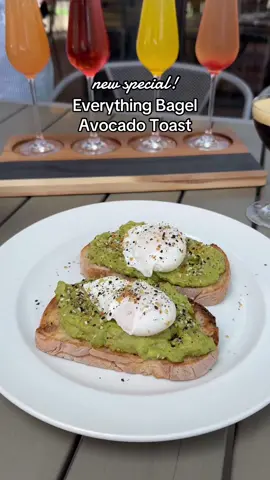 Brunch 7 days a week at Stax! This is our new special Everything Bagel Avocado Toast - mimosa flight in the background! 😍 #staxcafe #chicagobrunch #chicagofood #avocadotoast #yolkpop 