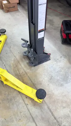 Working in a black tshirts and jeans definitely isnt the move but we are making things happen anyway..  #garagebuilt #storagegaragebuilt #classicmechanic #maxjaxm6k #liftinstallations 