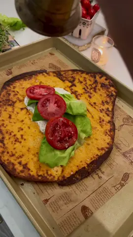 This easy lunch idea is packed with protein! With the wrap alone, you are getting an additional 35 g of protein High protein, sun-dried, tomato cottage cheese wrap  ✨1 cup full fat cottage cheese  ✨2 eggs ✨1 clove of garlic ✨1 Tablespoon sun-dried tomatoes in oil ✨onion salt  ✨Trader joes Aglio Olio seasoning (or everything but the bagel seasoning)  1.	Preheat your oven to 350°F. 2.	Add all ingredients, except the Aglia olio seasoning, to a blender. 3.	Blend for 30 seconds (do not over blend to avoid making it too runny). 4.	Spray your baking sheet with nonstick spray. 5.	Then Line the baking sheet with parchment paper. 6.	Spray the parchment paper with nonstick spray. 7.	Pour the batter onto the baking sheet in a thin layer and sprinkle with Aglio Olio seasoning  8.	Bake at 350°F for 30 to 35 minutes. Enjoy!  You can also make two smaller wraps, and save one for the next day, and just warm it up in the air fryer.  What’s in my wrap ✨sun dried tomato high protein wrap ✨bib lettuce ✨grilled chicken  ✨tomato ✨broccoli sprouts ✨high protein ranch (Greek yogurt + ranch seasoning)  ✨salt & pepper   #cookwithme #cookingathome #easylunch #wraps #lunchideas #easylunchideas #cottagecheesebread #quicklunch #cottagecheese #healthyrecipes #creatorsearchinsights 