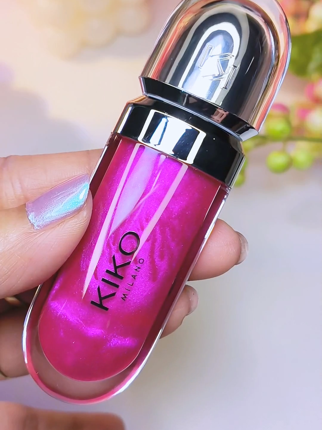 Kiko Milano 3D Hydra Lip Gloss  Shade 23 Magenta  This is one of the best selling shades.  Softening lip gloss for shiny, plumped lips. The soft texture feels wonderful, blending into the lips and leaving them smooth and radiant.  The lip gloss is available in 30 amazing colours and a variety of finishes: transparent, highly pigmented, shiny and pearly. The non-sticky texture is long lasting. #kikomilanolipgloss #kikogloss23 #kiko #makeupswatches #lipgloss #glossnglitters #glossnglittersbeauty #glossnglitterstiktok #fypシ゚viral #fypp #viralgloss #viralmakeup