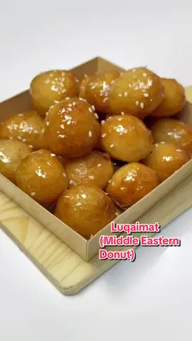 Luqaimat | Middle Eastern Donut Balls | Awamat #recipe⤵️ ✔️Dough 2 cups all purpose flour (270g) 1 tbsp instant dry yeast (9g) 1 tbsp sugar (12g) 1 tbsp cornstarch (10g) 1/4 tsp salt (1g) 1 & 1/2 cups lukewarm water (360ml) ✔️Syrup 2 cups sugar (400g) 1 cup water (240ml) squeeze of lemon juice saffron (optional) #arabic #arabian #middleeastern #sweets #donuts #cooking #tutorial #food #foodtiktok #yeastmodeph 