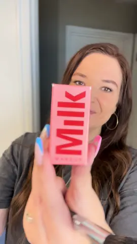@milkmakeup Cooling Water Jelly Tint Lip+Cheek Blush in- Spritz ✨ The box is pink so it counts right?!  This is a gorgeous Coral Orange shade that appears more of a pink coral hue to me. 🪸 Sheer burst of color that lasts all day!  Can be used lips cheeks eyelids! Packed with vegan collagen, aloe, and seawater for the cooling sensation. I highly recommend using a brush for application, gives you more control of the placement. It does dry quickly so I prefer this method. Hope you love it!  Have you tried one? If so which shade?! Thanks @milkmakeup for sending this!  •••••••••••••••••••••••••••••••••••••••••••• #milkmakeup #jellyblush #blushaddict #tintedblush #milkjellytint #sephorafavs #blushblush #trendingmakeup