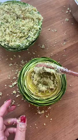 Recipe for Stuffed Artichokes Ingredients: 3 large Artichokes 1 1/2 cups grated Pecorino Romano Cheese 1 cup breadcrumbs 1/3 cup chopped parsley  2 tbsp of garlic  1/2 tbsp salt 1/2 tbsp black pepper  1/2 cup olive oil  Instructions: Cut 1/3 of the top off of the artichoke and the stem. Trim off the pointy ends of the leaves and scoop out the center. Place artichokes is cold water with the juice of 1-2 lemons.  In another bowl mix cheese, breadcrumbs, parsley, garlic, salt, pepper and olive oil. Mix together and stuff artichokes with the mixture. In a large pot add 2 cups of water, add artichokes, cover with a lid and simmer on low heat for 40-45 minutes.  Cool for 20 minutes before eating. Dipping in butter is optional because the stuffing has so much flavor already. #stuffedartichoke 