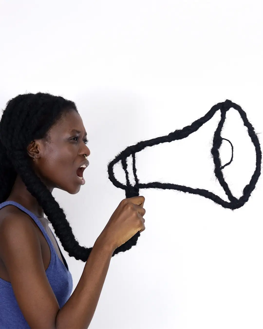 Some artists use paint, others sculpt with clay, but Laetitia Ky (@laetitiaky ) uses her hair as her medium. What started as a passion project to connect with her identity blossomed into a tool she uses to advocate and promote messages of bodily autonomy and self-acceptance. 