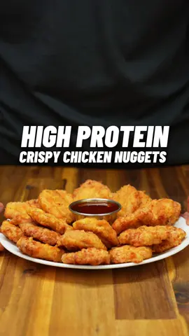 Easy High Protein Crispy Chicken Nuggets!🍗🔥 #crispychicken #highprotein #chickennuggets #highproteinsnack #fakeaway #easymealprep #lowcalorierecipes #gymfood #musclegain #highproteinrecipes #panaceapalm #EasyRecipes 134g Protein for the whole plate! Easy to make😋 Check out my high protein cookbooks for over 100+ recipes just like this one! 📕👨🏽‍🍳 (link in bio) Recipe Makes 20-22 nuggets 🍗 Calories & Macros 📊 Per nugget: 39 calories  6g P | 2g C | 1g F Whole Plate: 861 132g P | 39g C | 16g F Seasoned Chicken - 500g lean ground chicken (I made mine with chicken breast in a food processor)  - 1 large egg - tsp garlic powder - tsp onion powder - tsp paprika - 1/2 tsp cayenne - tsp salt - tsp black pepper Flour Station - 100g plain flour (40g for tracking) - same seasonings used for the chicken Wet station - 1 egg (beaten) Hot Honey Dip (optional) - 15g unsalted butter - 3 tbsp of Franks red hot - tbsp honey  - chilli flakes Spray the nuggets with cooking oil before cooking and give them another spray halfway through👌🏽 Cooking instructions ♨️ Air fry: 200°C for 12-15 minutes  Oven bake: 200°C for 18-22 minutes Check Out My High Protein Cookbooks for 100+ Recipes just like this one! (link in bio)👨🏽‍🍳📕 