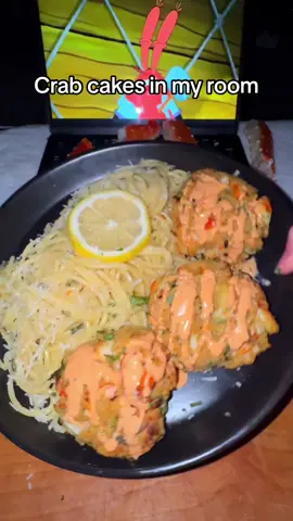 Making Crab Cakes in my room! 🦀🎂🥟  Ingredients & instructions 👇  Mix into a large bowl: * 1/2 Cup Mayo * 1 Egg * 1/3 cup Dijon Mustard * 1 Tbsp Worcestershire sauce * 4 Garlic cloves * 1-2 pounds of Crab Meat * 1 Cup Japanese Panko bread crumbs * Juice of half a lemon * Splash of red hot sauce * Lemon Pepper * Cajun Seasoning * Paprika * Onion Powder * Red Chili Flakes * Parsley * Chives Mix well, then form mixture into balls. Place them on a baking sheet. Melt some garlic butter and brush it on top of each crabcake. Bake for 20 to 25 minutes at 425°F. Repice IB thatsavagekitchen!  Optional Spaghetti: * Spaghetti * Parm * Butter * Olive oil * Heavy cream * Salt * Lemon juice * Pepper * More parm * Red pepper * Parsley #lazypotnoodle #Foodie #foodies #foodtiktok #FoodTok #EasyRecipes #FoodLover #crabcakes #crab #crablegs #crabrecipes #crabtok #freakbob #seafoodlover #seafood 