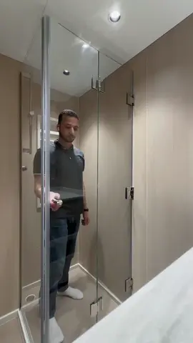 Folding shower crystal glass door with 316 grade stainless steel accessories for Yacht. #showerglassideas #foldingshowerdoor #showerglassdoor #customshowerdoor #showerenclosure #customshowerdoors #glassenclosure #showerfixedglass #foldingshowerglass 