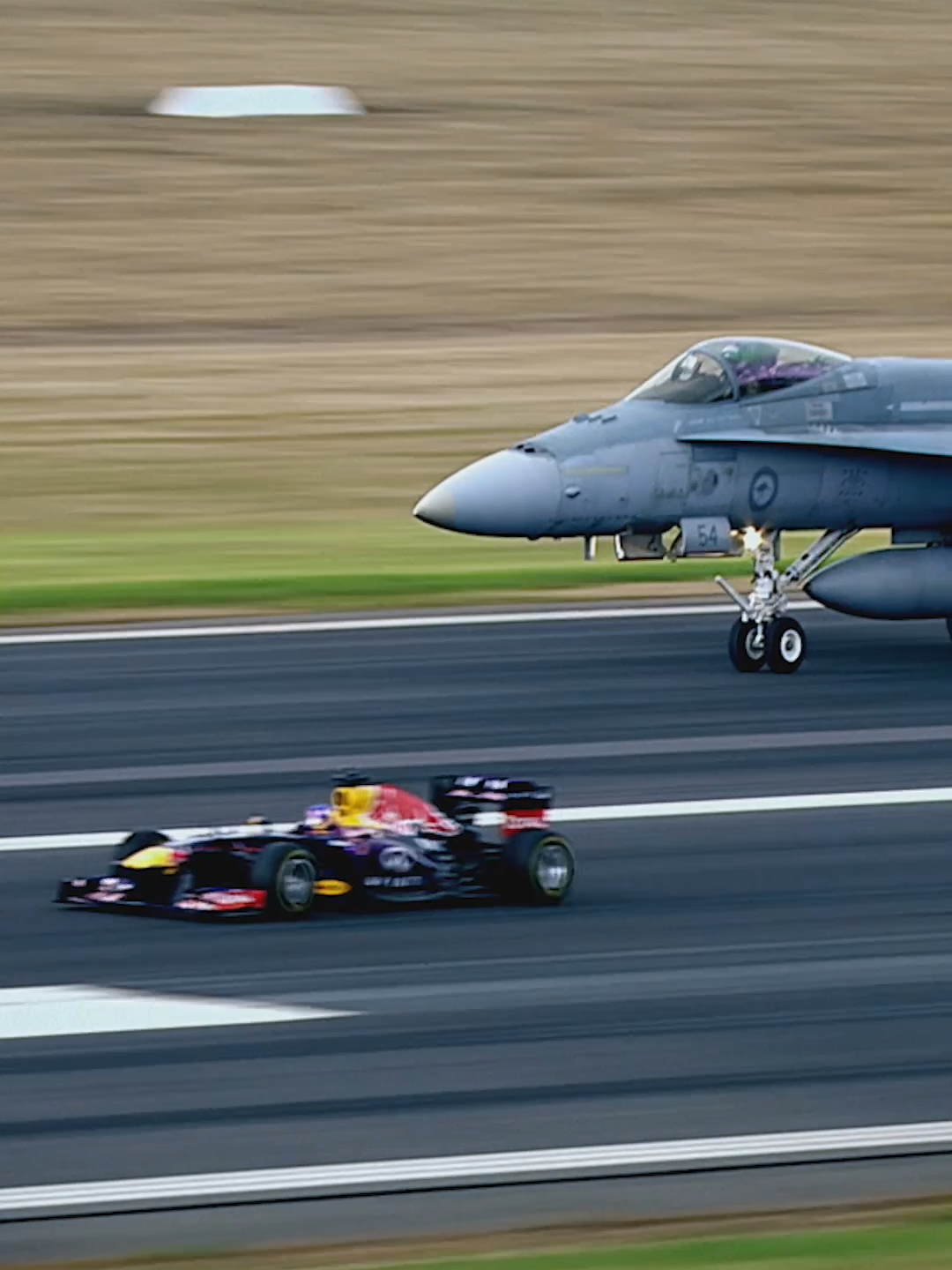 they both flew off the line 😏 #redbull #givesyouwiiings #energydrink #F1 #jet #dragrace #motorsports