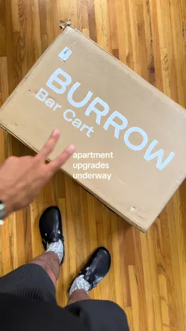 How do you think im going to style this new bar cart from @Burrow? 👀  #apartmenttour #apartmentdecor #decor #burrowroomies #burrow