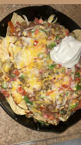 Fajita style Skillet Nachos ! Whats your favorite toppings to add to nachos? I added pico , refried beans , cheese , ground turkey , green peppers , red peppers and onions. #nachos #fajitas #walmart #kroger #foodinfluencer #Foodie #quickrecipes #oven #aldi #groceries #prbox #food #dinner #fyp #friday #privatechef 