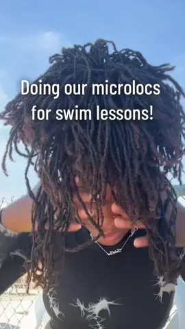 Stalling our micro lock for the swim lessons/swimming is super easy because it’s usually just a ponytail! We don’t have to worry about using a swim cap and I love that. #microlocs #swimming #naturalhaircare #microlocstyles #naturalhair #locs 