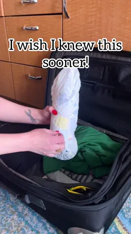 I learned this wine packing hack when my sister was living in Italy! Cushion the bottle AND prevent any potential spill if it breaks! #wine #winelover #traveltips #tipsandtricks #LifeHack