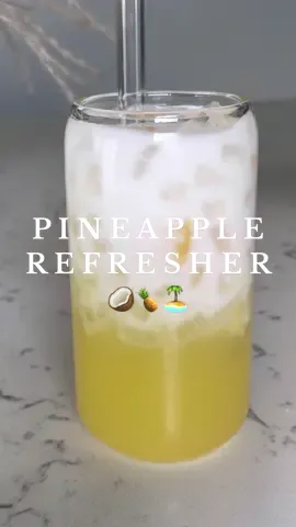 Pineapple Refresher 🍍🥥🍹 2 ingredient: -1 cup Pineapple juice  -pineapple chunks ( optional) -Coconut milk  Enjoy all summer long! ☀️🍹🏝️ #refreshing #pineapple #pineapplerefresher #drinksathome #coconutdrink #refreshment #summerdrinks #drinktok #pineapplejuice #homemade #easydrinks 