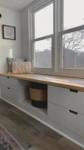 Bay window with a DIY window aeat using an IKeA hack! Find the whole tutorial on our site, https://houseonaustin.com/bay-window-diy-window-seat-ikea-nordli-hack/. #baywindow #diywindowseat #ikeanordli #diyprojects #homeimprovement 