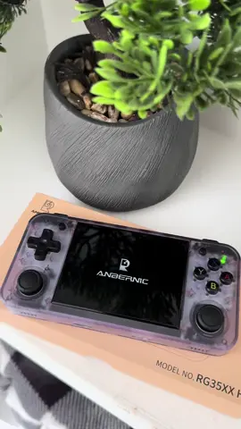 Level up your gaming with the Ambernic RG35XX! Enjoy a sleek design, vibrant display, and endless retro games. Perfect for gaming on the go! 🕹️✨ #RetroGaming #AmbernicRG35XX #GamingLife #HandheldConsole #Gamer #fyp 