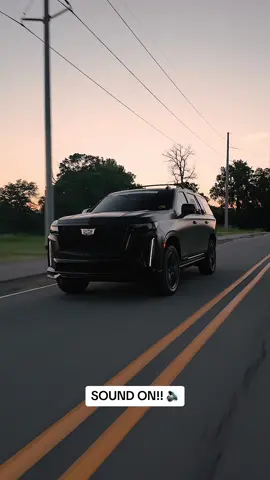 Chasing the sunset in the #EscaladeV. 🔥 This matte black certified pre-owned is available here at Parker Cadillac. 