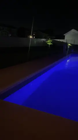 Summer Nights #backyardvibes #backyardoasis #swimmingpool #bluelights #poolside #pooltok #nighttimepool 