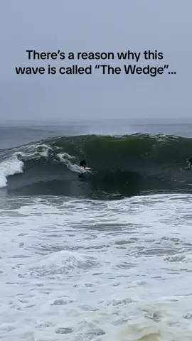 Waves bounce off of the jetty snd create a secondary wave coming into form a massive “wedge” peak! Comment below if yoy have been here before 🌊 #fyp #foryou #waves #surf #surfing #surftok #bigwaves #swell #wedge #shorebreak #massive 