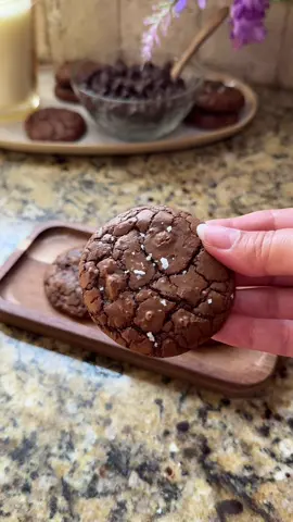 Brownie cookies🍫🍪💌                                              Recipe:                                                                          Ingredients -1/4 cup unsalted butter (56g) -4 ounces semi-sweet or dark chocolate chips -1/2 cup granulated sugar (99g) -1/2 cup light brown sugar (106g) -2 eggs, room temperature  -2 tsp vanilla -2/3 cup all-purpose flour (80g) -1/4 cup unsweetened cocoa powder (21g) -1/4 tsp salt -1/2 tsp baking powder  -1/2 cup semi-sweet chocolate chips (90g) -Sea salt flakes for topping Instructions: 1. In a microwave-safe bowl combine 4 ounces of chocolate chips and 1/4 cup butter. Microwave in 20-second intervals, stirring in between, until fully melted. Set aside. 2. In a large bowl beat the granulated sugar, light brown sugar, and eggs until light and frothy, about 5 minutes. 3. Add the melted chocolate and vanilla. Mix until combined. 4. Sift in flour, cocoa powder, salt, and baking powder. With a spatula fold together until almost fully combined. 5. Fold in the 1/2 cup semi-sweet chocolate chips until fully combined. 6. Cover the bowl and chill for 30 minutes. 7. Preheat oven to 350°F. 8. Scoop the cookie batter with a 2 tablespoon cookie scooper and place on a lined baking sheet 2 inches apart.  9. Bake 8-10 minutes. Sprinkle sea salt flakes on top and let the cookies cool for about 15 minutes so that they set properly. Makes about 17 cookies. #chocolate #brownies #cookies #baking #Recipe #bakingtiktok #bakingvideo #dessert #foryou #EasyRecipe #bakingtherapy #baketok #girltherapy #fyp 