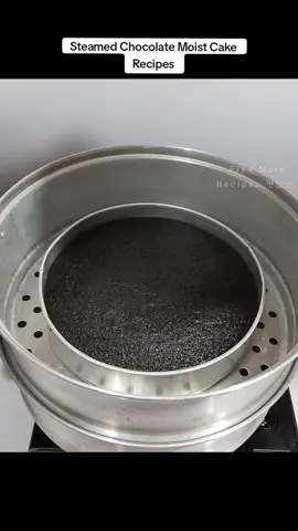 Steamed Chocolate Moist Cake Recipes  Chocolate moist cake ingredients  1¼ cup Evaporated milk (312ml) 2 egg  1 teaspoon vinegar (4ml) 1 teaspoon vanilla (4ml) 1/2 cup cooking oil size cup (125ml) 1 tbsp baking powder (10g) 1/2 teaspoon salt (2g) 1 teaspoon baking soda (3g) 1/2 cup cocoa powder (40g) 2 cup+1 tbsp all purpose flour (250g) 1½ cup sugar brown or white (300g) Ganache  1/2 cup sugar (100g) 3 tablespoon cornstarch (24g) 2 tbsp cocoa powder (16g)  1½ cup Evaporated milk (370ml) 2 tbsp butter or margarine (20g) 10x2 size pan  Steam medium heat up to 15 minutes after 15 minutes low heat up to 20 minutes  #howtomake #chocolatemoistcake #chocolatecake #withoutoven #steamed #recipes #freemorerecipes #reels #shorts 
