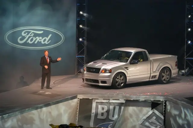 Ford’s bold vision for a third-generation SVT F-150 Lightning sport truck emerged today from a powerful new-product cloudburst at the 2003 North American International Auto Show. The SVT Lightning concept was a surprise during Ford’s unveiling of the all-new 2004 F-150. Launching a “Whole New Era of Built Ford Tough,” the new F-150 is an all-new full-size pickup architecture designed for more power, refinement and unprecedented driving dynamics capability. It is the star of Ford Motor Company’s biggest-ever wave of new-product introductions at the dawn of its Centennial year. “We are excited about the new F-150, because it will provide an outstanding platform for the next-generation Lightning,” says Tom Scarpello, marketing and sales manager for Ford Special Vehicle Team (SVT). “The SVT F-150 Lightning concept hints at what we could do with Lightning and sends a signal that we don’t intend to give up our dominance of the sport truck market.” The SVT F-150 Lightning concept features a six-speed manual transmission, independent rear suspension and a 500-horsepower supercharged V-8. It is a powerful combination aimed at extending SVT Lightning’s supremacy into the future. Since it was introduced in 1993, the Ford SVT F-150 Lightning has been the undisputed sport truck king, making a name for itself as the “World’s Fastest Production Pickup.” Ten years later, competitors are finally bringing Lightning imitators to market. John Coletti, director, SVT Programs, welcomes the challenge. “It will be nice to finally have a little cross-town rivalry,” Coletti said. “But we have no intention of being overshadowed on our home turf. The SVT Lightning Concept showcases technology we’re developing to meet the competition head-on.”  #Ford #sportstruck #pickuptruck #vehicle #concept #conceptcar #fypツ #fypシ゚ #fypツ #fypシ゚ #fypage #fypage 