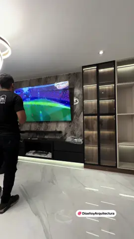 🌟 ¡Bienvenido a la sala de tus sueños! 🌟 Este mueble de melamina para TV con chimenea y luminaria elegante es la pieza que estabas buscando para darle un toque de sofisticación a tu hogar. 🔥 Con su diseño moderno y funcional, podrás disfrutar de tus series y películas favoritas frente a una cálida chimenea 📺✨ ¡Dale un toque de elegancia a tu sala de estar con este mueble único! 💫🛋️ #interiorismo #diseñodeinteriores #decoraciondeinteriores #arquitecturaydiseño 