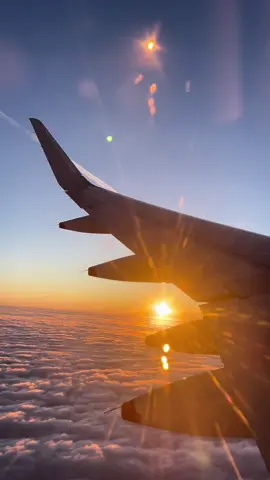 sunset from the window seat #traveltiktok #europetravel #eurosummer #summertok #planetravel 