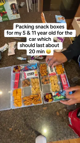 Snack boxes for two of my kids to bring on our family vacation tomorrow! Wont last them long but I tried 🤣 #kidsnack #snackideas #snackideasforkids #targetdollarspot 