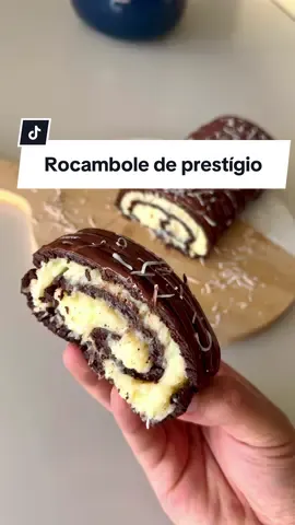 Rocambole de prestígio fácil 🤤 Gente, essa receita ficou SENSACIONAL, sério! Vocês precisam fazer 🤤 Recheio:  1 lata de leite condensado  1 caixinha de creme de leite  100 gramas de coco seco ralado  1 colher de sopa de manteiga  Modo de preparo:  Misture todos os ingredientes em fogo baixo até ponto de brigadeiro firme, espere esfriar.  Massa:  2 xícaras de leite em pó  2 xícaras de chocolate em pó 50% cacau  Uma caixa de leite condensado  Misture todos os ingredientes até ficar uma massa maleável que não gruda nas mãos, se grudar acrescente mais leite em pó.  Leve pra geladeira por 10 minutos e depois abra a massa, recheie, enrole e decore com chocolate derretido e coco. Aproveite!❤️ #prestigio #rocambole #recheio #chocolate #receita #confeitaria #comida #doces #sobremesa