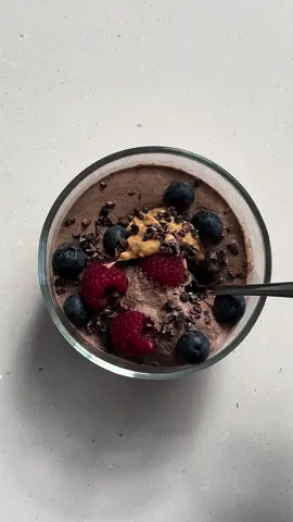 choc chia mousse 🤎 gf/df  if you’re like me and HATE the texture of slimy chia pudding, try blending them! i saw this a while ago when it was trending but have only just decided to try it, and it turned out soo much better than i expected to be honest!! maybe add a little less liquid if you want it to be a bit thicker, but that’s completely up to you. 🤤  ingredients: 3 tbsp chia seeds 2 tbsp vanilla yoghurt 1 scoop choc protein powder 1 tbsp cacao powder 1 tsp sweetener (maple syrup, honey etc) 1 cup plant based milk  method: combine all ingredients in blender and blitz until smooth, pour into container and allow to set overnight. top with whatever you like and enjoy!  toppings i used: raspberries blueberries crunchy peanut butter  cacao nibs  #chocolate #chiapudding #mousse #chiamousse #blendedchiaseeds #chia #chiaseeds #pudding #chocolate #highprotein #fibre #highfibre #breakfast #snack #protein #chocolatechia #healthyfood 