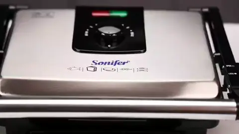 Sonifer Electric Grill SF-6012 .Stainless steel body surface .Non-stick grill cooking soleplate .Closed hinge for easy cleaning .Cool touch housing provides extra safety .Slide-resistant feet .Brilliant power light and ready light .Over heat protection .Cool touch handle .220-240V,50/60Hz,2000W