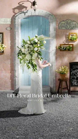 Come rain or shine, you will radiate love on your wedding day with this DIY floral umbrella in May Lily & Olive ☂️⛅ Have you ever seen a wedding accessory as gorgeous as this?! #DIY #lingsmoment #uniquewedding #floralumbrella #diydecor