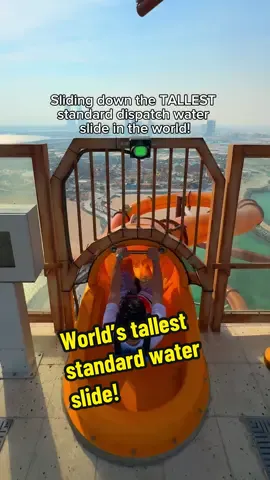 World’s TALLEST standard water slide! 🤯 Would you try this? #travel #waterpark #waterslide #thrill #adrenaline #qatar #slide 