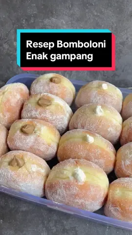 Assalamualaikum ✨ Bomboloni ini versi pakai kentang ya.. resepnya udh pernah aku share ini aku tulis lagi.. Untuk isian aku pakai whipcream menyesuaikan yg ada dirumah aja , whipcream aku kasih pasta mocca sedikit , untuk yg putih whipcream nya dikasih keju parut , kalian boleh ganti menyesuaikan selera yaaa.. bsa pkai ButterCream , selai / coklat glaze 🤗 . Bomboloni / Donat Kentang  By @dianfaizin17 . Bahan A : 250 g terigu pro tinggi 3 gr ragi 1 gr Bread improver 15 gr susu bubuk 40 gr Gula pasir . Bahan B : 1 butir telur 40 gr susu cair dingin dari kulkas 100 gr kentang yg sudah d kukus dan d haluskan . Bahan D : 25 gr Mentega  2 gr garam . Langkah : 1. Satukan semua bahan A aduk rata.. masukan bahan B ulen tangan dlu hingga setengah kalis 2. Setelah setengah kalis masukan bahan D mixer lagi sampai kalis elastis ( kecepatan mixer bertahap ya dari rendah lama2 naik ke paling tinggi ) 3. Setelah kalis … bulatkan adonan bagi adonan sama rata aku 30 gr , bulatkan rounding tata di wadah tabur tepung tutup diamkan 15 menit 4. Ambil adonan kemudian cetak ( degassing ) aku cetakan 6cm  , lakukan sampai bulatan adonan habis harus berurutan ya yg pertama di cetak nanti pertama di goreng juga 5. Tata di loyang yg sudah d tabur tepung .. diamkan / aku proofing terbuka , sampai mengembang 2x lipat aku -+ 2 jam.. sesuaikan suhu dirumah masing2 ya 6. Goreng di minyak yg sudah d panaskan sebelumnya api sedang cenderung kecil jgn di bolak balik , jangan pakai api besar 7. Balur donat dgn gula halus , lubangi , dan beri isian sesuai selera , beneran deh empukkk bnget . #donatlembut #donatkentang #resepdonat #resepdonatkentang  #berbagiresep #fyp #foryou #fypシ゚viral #berandatiktok #tiktokfyp #viralvideo #belajarmembuatdonat#idecemilan #idejualan #caramembuatdonat #bomboloni #resepbomboloni 