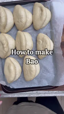 How to make Bao.   #ad I’ve teamed up with AEG to show you this simple recipe that’s made incredibly easy with their 9000 SteamPro oven.    This makes 8 bao   Ingredients   250ml tepid water 50ml whole milk 5g dried active yeast 40g sugar 530g strong white flour 4g salt 15g baking powder   Method   1. Mix the water, milk, yeast and sugar. When combined, allow to sit for 15 mins. 2. Combine the dry ingredients and bring it together to form a dough, ensuring there are no dry flour patches. 3. Knead for approx. 10 mins until smooth. 4. Add a little oil to a bowl, add your dough and cover with a lid or towel to prove for 90 mins. 5. When doubled in size, knock back the dough and divide into 100g dough balls, roll them into balls then use a roll pin to make an oblong shape. 6. Brush with a little oil and fold, cover and prove again for 30 mins. 7. Set the steam oven to 100c or set up a pan of boiling water with a steamer basket on top. 8. Add the bao to baking parchment and steam for 12-13 mins until soft and fluffy. 9. Serve with your favourite fillings - I had teriyaki style pork, sliced cucumber, spring onions, sriracha mayo and coriander. #bao 