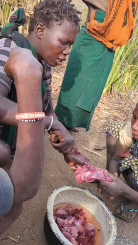 This,, 🔥 Woman hadzabe tribe prepare their food lunch 🤤 it's Amazing tradition lifestyle.