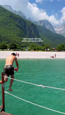Escape to 📍Molveno, Italy 🇮🇹—a perfect blend of Mediterranean warmth and Alpine coolness⛰️💫 Molveno Lake has been awarded the title of Italy's most beautiful lake multiple times😍  🎥 @llavieboheme  #mountains #ladolcevita #dolomites #italytravel #italytiktok #traveltiktok #lakelife #summerswim