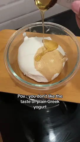 Transforming plain Greek yogurt with a tablespoon of vanilla extract and honey! 🍯✨ Say goodbye to bland and hello to flavor! #YogurtHack #HealthyTreats  #greekyogurt 
