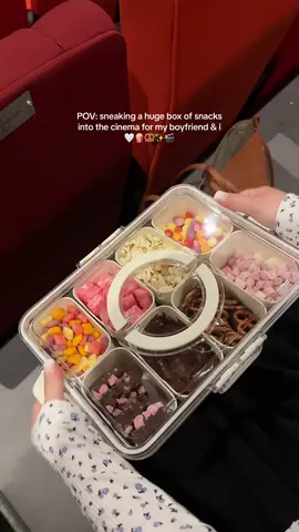 You HAVE to do this next time youre at the movies 😍🥨🍿🎬 I made a snack box for me and the boyf - he was shook 🤤 #snackbox #snacks #asmr #snacklebox #sweets #candy #snackideas #veganfood #FoodTok #organization #snackbreak #thatgirl #tiktokshop 